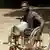 A victim of Sierra Leone's civil war in a wheelchair