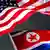 The flags of the US, North Korea flap in the wind