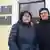 Главред газеты "Новы Час" Оксана Колб и журналист Денис Ивашин возле здания суда