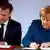 Ангела Меркель и Эмманюэль Макрон подписывают договор
