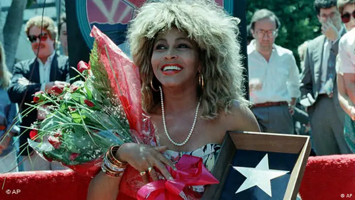 Tina Turner being honored with a star on Hollywood's Walk of Fame