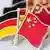 Националните флагове на Германия и Китай