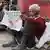 A man in Delhi reads newsppaer amid COVID-19 lockdown
