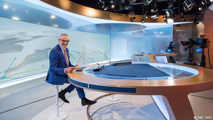The DW News studio in Berlin with presenter Gerhard Elfers