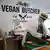 An employee slices vegan meat alternatives at a vegan Butcher in the UK