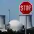 The nuclear power plant Biblis with a stop sign in the foreground