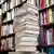 A stack of books in a bookstore.
