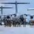 Bundeswehr troops arrive on a German airbase after finishing the Afghanistan evacuation mission on August 27, 2021