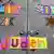 colorful letters read 'wir sind juden' on a gate with six pointed stars 