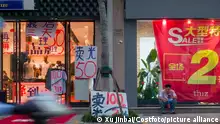 NANTONG, CHINA - AUGUST 5, 2021 - A bricks-and-mortar clothing store is on sale at a discount in Haian city of Nantong, Jiangsu Province, China, August 4, 2021.