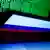 Российский флаг на экране ноутбука на фоне компьютерного экрана с цифрами