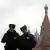 Двое полицейских в Москве на фоне храма Василия Блаженного