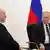 Belarus President Alexander Lukashenko, turned to his side, and Russian President Vladimir Putin, fully clear, in this picture