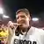 Eintracht Frankfurt coach Oliver Glasner bites his medal after his team won the Europa League