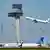 Plane taking off from Berlin airport with control tower