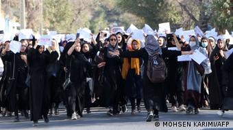 Two days after a suicide bomb attack in a learning centre in Kabul, Afghan female students chant Education is our right, genocide is a crime during a protest as they march from the University of Herat toward the provincial governor's office on October 2, 2022