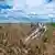 Обломок ракеты на пшеничном поле в Украине 