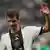 Thomas Müller waves a hand during Germany's match with Costa Rica