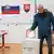 A man casts his vote in a polling station in Slovakia on January 21, 2023