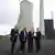 German Chancellor Olaf Scholz, Minister-President of Saarland Anke Rehlinger, ZF CEO Holger Klein and Wolfspeed CEO Gregg Lowe pose for a picture as they attend an event on the future of the decommissioned coal-fired power plant in the Western German Saarland region in Ensdorf, Germany