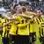 Goalscorer Julian Brandt celebrates with Borussia Dortmund teammates
