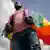 A man with a rainbow flag