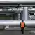 A man walking in front of the  Nord Stream 2 pipeline in Lubmin, Germany