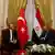 Egyptian Foreign Minister Sameh Shoukry and Turkish Foreign Minister Mevlut Cavusoglu seeted at press conference