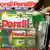 Тележка в супермаркете с упаковками стриального порошка Persil концерна Henkel