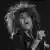 Tina Turner sings at a concert 