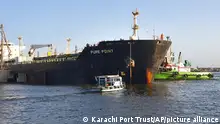 In this photo released by Karachi Port Trust, a Russian oil cargo carrying discounted crude, is anchored at a port, in Karachi, Pakistan, Sunday, June 11, 2023. The Pakistani government on Monday welcomed the arrival of the first shipment of discounted crude from Russia under a key deal between Islamabad and Moscow. (Karachi Port Trust via AP)