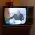 Лукашенко на экране телевизора