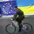 Солдат ВСУ едет на велосипеде на фоне флагов ЕС и Украины