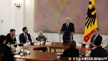 German Holocaust survivor and public speaker Margot Friedlander (4th L) listens as German President Frank-Walter Steinmeier (C) greets his guests for talks titled War in the Middle East: For a peaceful life together in Germany as the German President hosts a round table for a dialogue on a cohabitation without anti-semitism and islamophobia, on November 8, 2023 at the presidential Bellevue Palace in Berlin. (Photo by Odd ANDERSEN / AFP)
