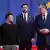 Ukrainian President Volodymyr Zelenskyy (left) and Serbian President Aleksandar Vucic (right) look at each other as they pose for a family photo with other leaders after the Ukraine-Southeast Europe summit in Tirana, Albania, February 28, 2024