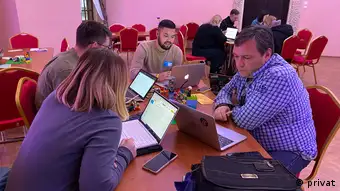 Gaygysyz Geldiyev at work consulting his client's team. 