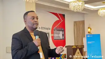 Asrat Seyoum hosting the Radio Days Conference, celebrating community radios in Ethiopia.