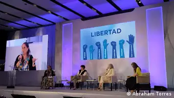 Mariana Alvarado del Real speaking on a panel.