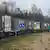 Ukrainian cargo trucks stand in line as an ongoing blockade by Polish farmers continues at the Polish-Ukrainian border in Dorohusk