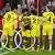 Borussia Dortmund's players celebrate Karim Adeymi (second left) scoring