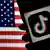 A TikTok symbol in front of a US flag