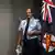 New South Wales Deputy Commissioner David Hutson in front of state flag on April 24