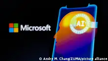 May 16, 2023, Asuncion, Paraguay: Microsoft logo is displayed behind visual representation of human brain, the term ''AI'' and the words ''artificial intelligence'' displayed on a smartphone. (Credit Image: Â© Andre M. Chang/ZUMA Press Wire